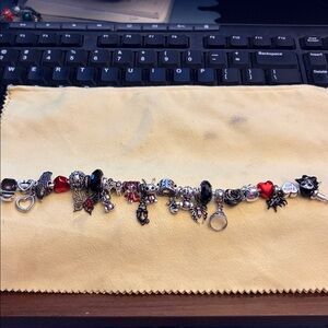 Silver and Red Charm Linx Bracelet
